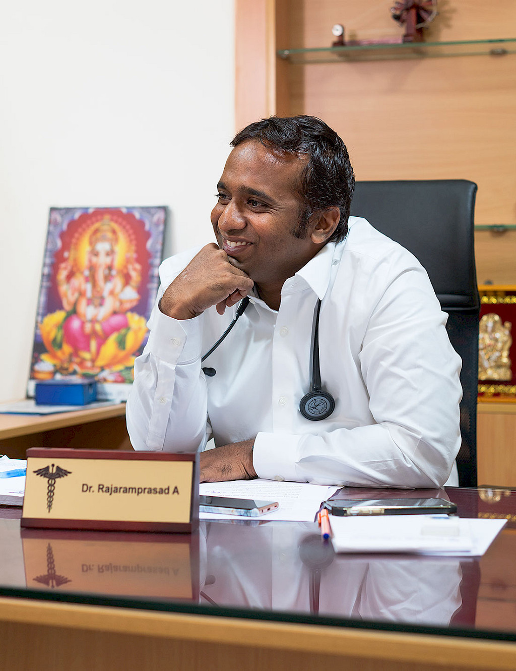 Portrait of cardiologist Dr. Rajaram Prasad at his desk in his office at SIMS Chellum Hospital.