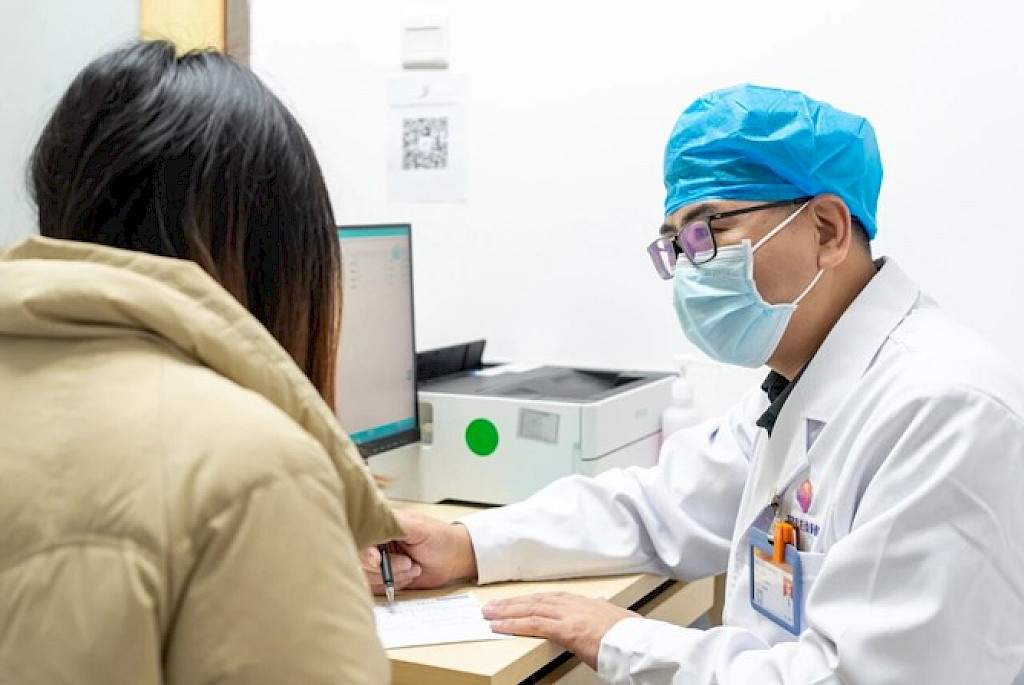 Director Yang takes time for patient education, treatment planning, and addressing the concerns of all patients.
